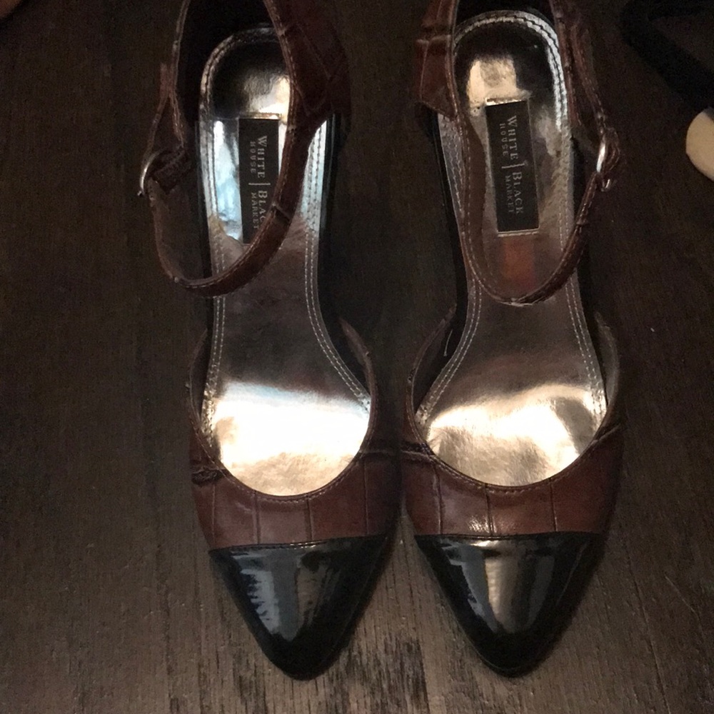 Brown and black cap toe heels